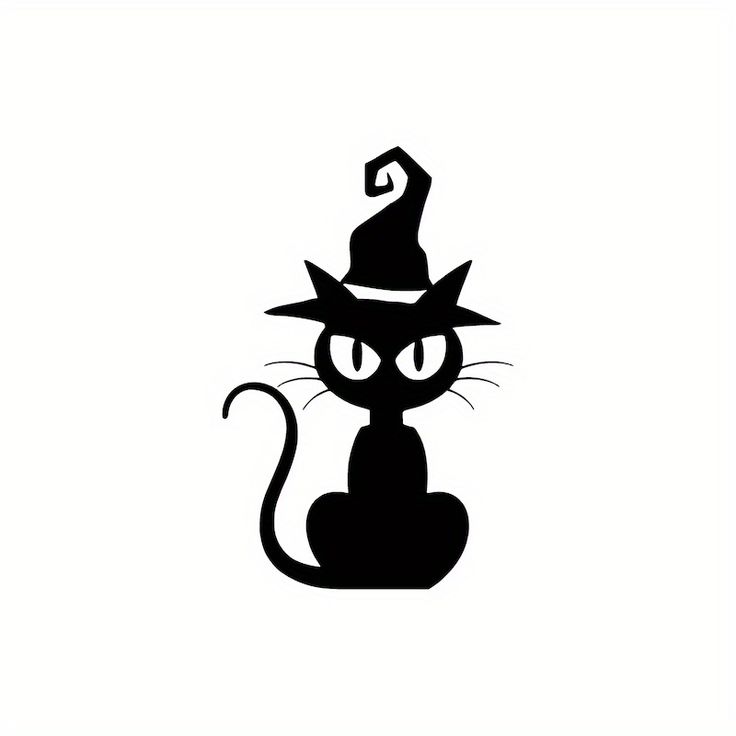 a black cat wearing a witches hat