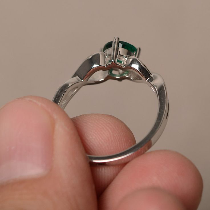 This is a gorgeous handmade creation. Its beauty is its simplicity & Elegance. The 6*6mm round shape faceted lab Emerald is crafted in solid sterling silver and with rhodium plated. All item is sent in a beautiful gift box If you have any idea of design your ring,pls contact me directly. You can realize more lovely stuff clicking the link https://www.etsy.com/shop/knightjewelry?refshopsection_shophome_leftnav Please leave the correct address and you phone number for delivering successfully. Emerald Crystal Ring With Center Stone, Sterling Silver Ring With Prong Setting For May Birthstone, Sterling Silver Emerald Ring With Accent Stones For Promise, Emerald Promise Ring With Accent Stones In Sterling Silver, Emerald Promise Ring With Center Stone, Solitaire Round Emerald Ring For Promise, Round Emerald Solitaire Ring For Promise, Round Solitaire Emerald Promise Ring, Sterling Silver Emerald Ring With Accent Stones