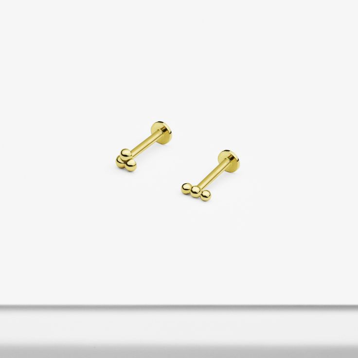 Each order includes a single earring. Material: 14k Solid Gold Size: Post Length 6.5mm, Post Thickness 1mm(18G) Color: Yellow Gold All jewelry comes in a gift-ready box. Customers can request a greater quantity or 14k Rose Gold. Gold Internally Threaded Drop Cartilage Earrings, Cartilage Helix Piercing, Labret Studs, Tiny Earrings, Helix Piercing, Single Earring, Dainty Earrings, Tragus, Stud Earring