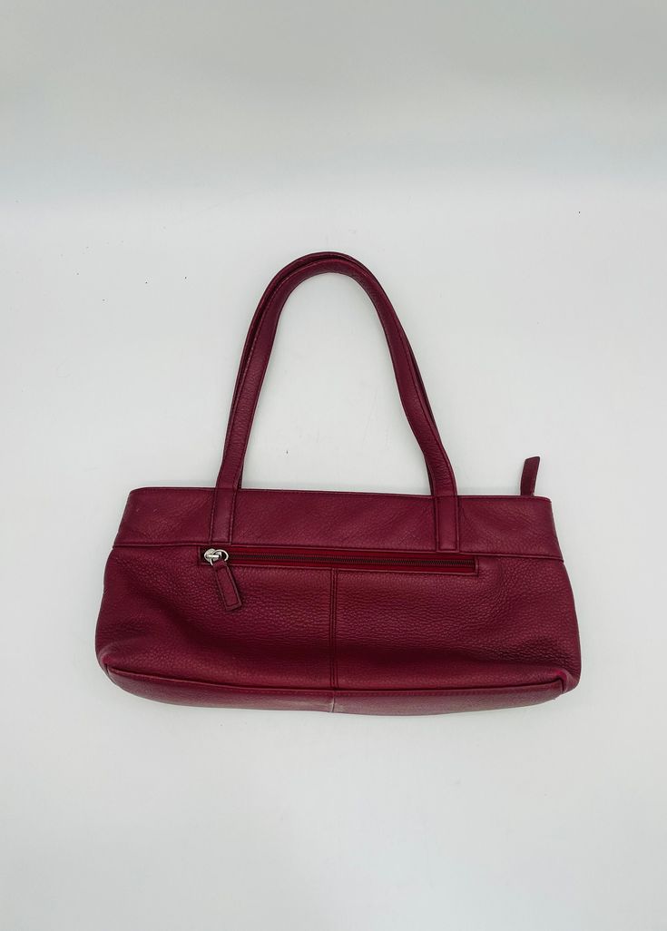 Lovely Stone Mountain Leather Satchel Handbag in Burgundy Red.  Has two outer and one inner zipped pocket along with one velcro and one open pocket on the inside with a zipped closure.  Has a spot on the inside lining, a bit of minor wear on the seam bottom and straps, overall,  good condition. Measures 13" long x 2.75" deep x 6.25" high not including the straps Double Strap Dropdown is 8" Red Double Handle Shoulder Bag With Zipper Pocket, Classic Red Shoulder Bag With Zipper Closure, Burgundy Shoulder Bag With Zipper For Errands, Burgundy Shoulder Bag With Zipper Closure For Errands, Burgundy Shoulder Bag For Errands With Zipper Closure, Red Bags With Zipper Pocket And Double Handle, Red Satchel Bag With Zipper Pocket, Classic Burgundy Bag With Zipper Closure, Classic Burgundy Shoulder Bag With Zipper Closure