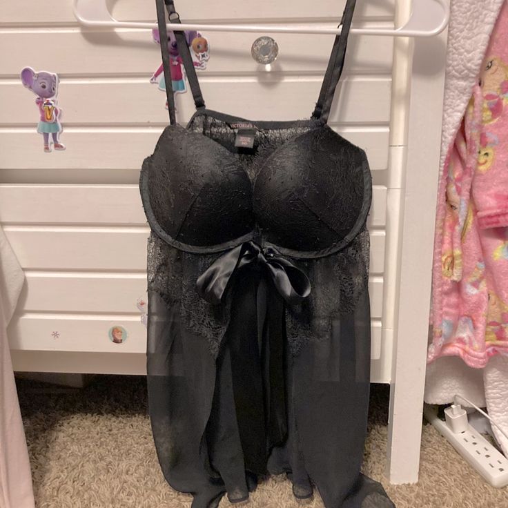 Never Worn Black Lace Front Tie Sexy Top. Cup Size Is 34d Black Underwire Bra For Night Out, Night Out Underbust Bra With Built-in Support, Black Lace Party Bra, Victoria's Secret Black Sheer Sleepwear, Black Stretch Camisole Sleepwear, Black Lace Bra For Night Out, Victoria's Secret Camisole For Party, Victoria's Secret Black Lined Bra, Underwire Sleepwear With Built-in Bra