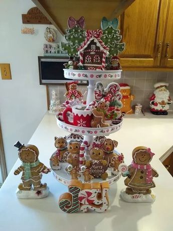 a christmas tree made out of gingerbreads and cookies on a kitchen counter top