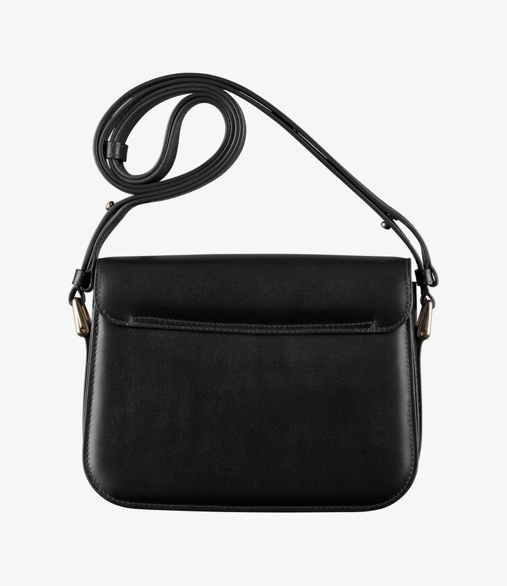 A.P.C. Women's bag. - Leather bag inspired by chic vintage bags, in a mini size.- Soft cowhide leather.- Adjustable leather shoulder strap.- Can be worn on the shoulder or across the chest.- Goldtone metal clasp.- Flap lined with cowhide suede split leather.- One large compartment.- Two large pockets.- Two goldtone rings on the sides.- Embossed goldtone 'A.P.C. Rue Madame Paris' logo. Luxury Black Flap Saddle Bag, Evening Rectangular Saddle Bag With Detachable Strap, Rectangular Saddle Bag With Detachable Strap For Evening, Evening Crossbody Saddle Bag With Adjustable Strap, Black Rectangular Saddle Bag For Formal Occasions, Classic Crossbody Saddle Bag With Detachable Strap, Evening Flap Shoulder Bag With Adjustable Strap, Evening Saddle Satchel Bag With Adjustable Strap, Evening Shoulder Bag With Adjustable Strap