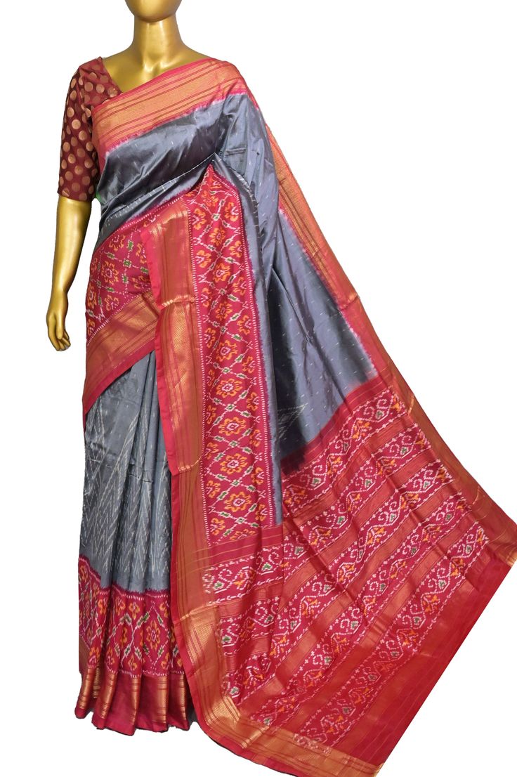 Just the kind of festive vibe that you would like to set - let's do it with the ikat silk. The hand-picked collection with a traditional geometric motif design on the body with ikat weaving work on the pallu and the golden zari border. It also sports an amazing double temple border which makes it unique. Color: A shade of grey and magenta color Technique: Amazing work of traditional tie and dye work on the whole saree with zari work Fabric: Ikat Silk Quality: IndyVogue's Assurance of Silk Mark Certified Multicolor Silk Ikat Print Sets, Bollywood Style Dupatta With Ikat Print, Designer Ikat Print Dupatta For Festivals, Designer Ikat Print Dupatta, Festive Ikat Print Dupatta, Traditional Ikat Print Dupatta, Traditional Ikat Print Dupatta Designer Wear, Traditional Ikat Print Dupatta For Designer Wear, Navratri Silk Traditional Wear With Ikat Print