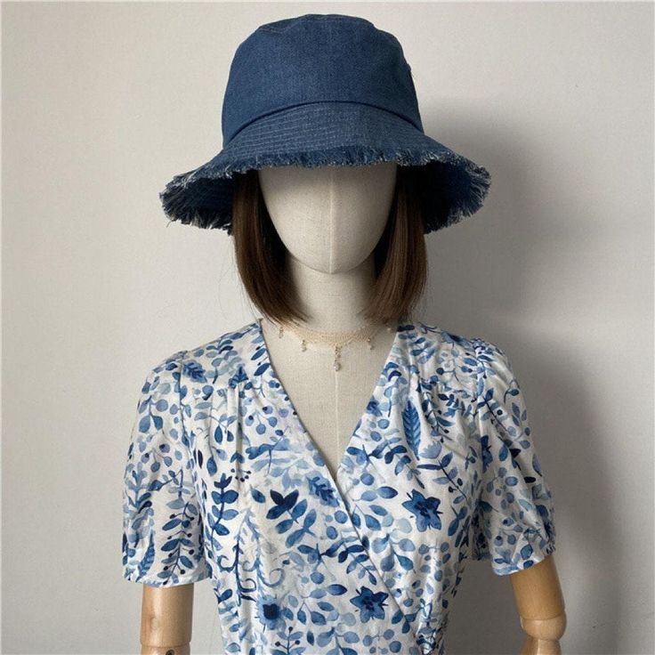 Introducing our Denim Bucket Hat: your go-to accessory for style and sun protection! Crafted from premium denim, it's not just a hat, it's a statement piece. With three chic colors to choose from, it's perfect for any occasion - from beach days to city strolls. Available in three sizes, including options for larger heads, ensuring the perfect fit for everyone. Treat yourself or surprise a loved one with this versatile and stylish bucket hat.Specifications Material: 100% Denim Size: M: 56-58cm Blue Wide Brim Cotton Sun Hat, Blue Wide-brim Cotton Sun Hat, Blue Cotton Wide Brim Sun Hat, Trendy Cotton Sun Hat With Flat Brim, Casual Flat Brim Bucket Hat For Summer, Blue Cotton Wide Brim Hat, Denim Blue Brimmed Cotton Hat, Brimmed Cotton Hat In Denim Blue, Cotton Brimmed Hat In Denim Blue