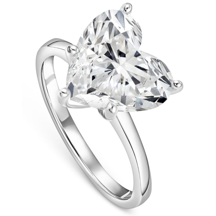 a pear shaped diamond ring on a white background