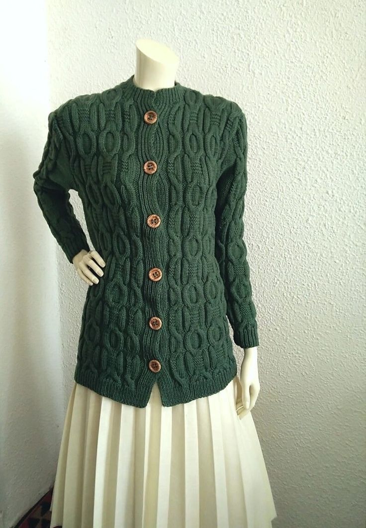 80s-90s cable knit cardigan, long spring jacket, big buttons pullover, dusted green sweater, aran fisherman style, handknitted long cardigan. GOOD VINTAGE CONDITION BUT THE SWEATER IS NOT DRY CLEAN. Measurements laying flat : shoulders 43 cm (17inches) armpit to armpit :46 cm (18 inches) total lenght :76 cm (30 inches) sleeve lenght :59 cm (23 inches) Winter Green Cable Knit Cardigan, Green Knit Outerwear With Buttons, Cozy Green Sweater With Buttons, Green Cable Knit Long Sleeve Sweater Coat, Green Long Sleeve Cable Knit Sweater Coat, Green Cable Knit Sweater Coat With Long Sleeves, Fitted Green Cable Knit Cardigan, Fitted Long Sleeve Cable Knit Sweater Coat, Vintage Cable Knit Outerwear For Fall