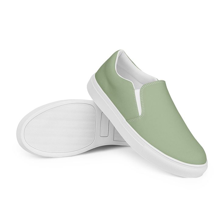 STUNNING SAGE GREEN SLIP-ONS ARE COMFY AND THE PERFECT SPRING COLOR. Please check the sizing chart between the listing photos. Made for comfort and ease, these sage green women's slip-on canvas shoes are stylish and the ideal piece for completing an outfit. Equipped with removable soft insoles and rubber outsoles, it's also easy to adjust them for a better fit. Designed by Glorianna Center, Nataša Mulec s.p.. Made and sent by Printful. *  100% polyester canvas upper side *  Ethylene-vinyl acetat Green Slip-ons With Rubber Sole For Summer, Green Flat Heel Slip-ons For Spring, Comfortable Green Slip-ons For Spring, Casual Green Closed Toe Slip-ons, Green Flat Slip-ons For Summer, Green Rubber Sole Sneakers For Spring, Comfortable Green Slip-on Sneakers With Round Toe, Spring Green Sneakers With Rubber Sole, Green Sneakers With Rubber Sole For Spring