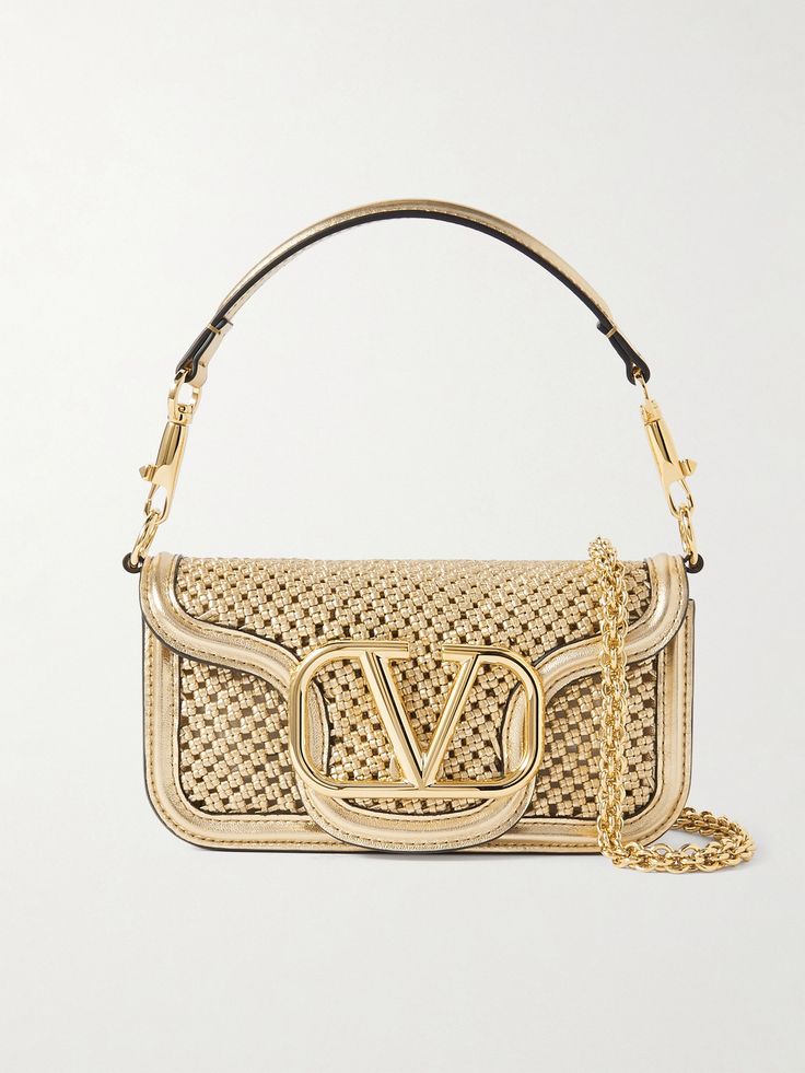 This version of Valentino Garavani's iconic 'Locò' bag is woven from strips of gold leather to match the gleaming 'VLOGO' hardware. It has a detachable top handle and chain shoulder strap, so you can customize how you carry it. Inside, there's enough space for your phone, keys and a lipstick. Valentino Bag, Hot Bags, Gold Bag, Luxury Purses, Raffia Bag, Evening Handbag, Valentino Bags, Gold Leather, Luxury Accessories