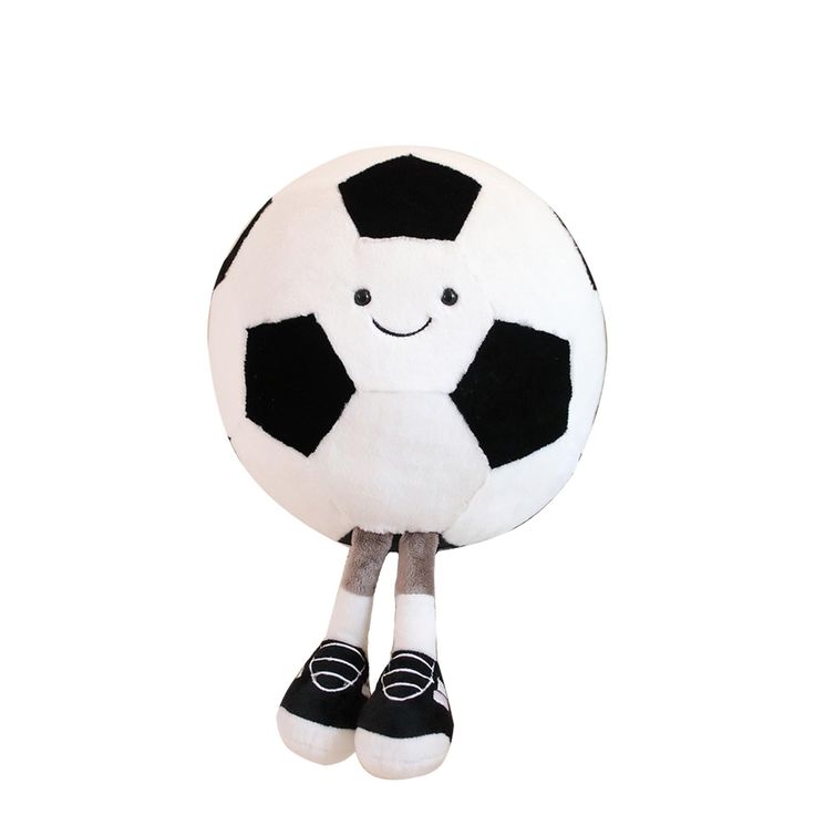 a stuffed soccer ball with black and white stripes on it's legs, sitting upright