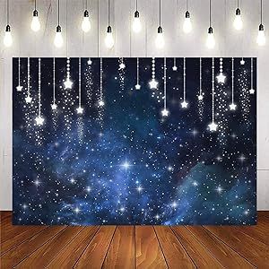 an image of a space scene with stars in the sky and lights hanging from strings