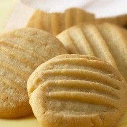 some cookies are sitting on a yellow plate