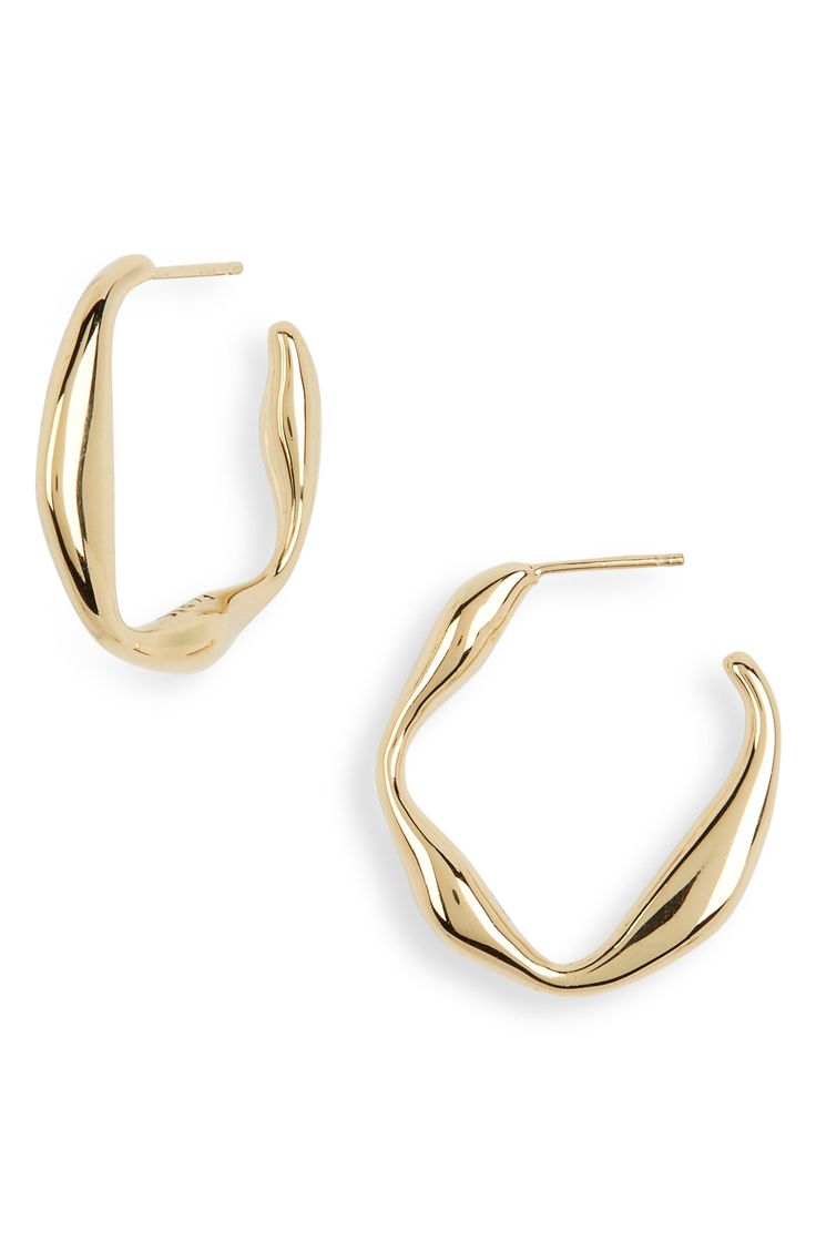 Wavy hoop earrings shaped to look like molten gold bring a rich glow to your lobes. 1" hoop diameter; 1/8" width Post back 14k-gold plate Made in Italy Molten Gold, Gold Earrings, To Look, That Look, Gold Plate, Hoop Earrings, In Italy, Nordstrom, Italy