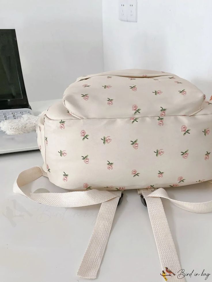 BirdinBag - Functional Floral Graphic Backpack Featuring a Bag Charm Cute Large Capacity Standard Backpack, Back To School Pouch Bag, Back To School Pouch Bag For Daily Use, Back To School Pouch For Daily Use, Cute Softback Travel Bags, Cream School Pouch Bag, Casual Backpack Shoulder Bag For Study, Cute Cream Travel Bag, Cute Beige Backpack Bag