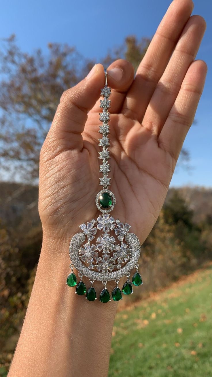 This is a very beautiful Mangtika available in dark green color with AD Diamonds. The material is first-rate brass which will not tarnish as it does not contain real silver. We use the best materials and provide the best workmanship for our customers! Pair it with any western or traditional outfit. Ready to ship from our home to yours! Unique Wedding Hair, Afghani Jewelry, Traditional Outfit, Hair Jewellery, Dark Green Color, Hair Jewelry Wedding, Oxidised Jewellery, Head Accessories, Look Alike