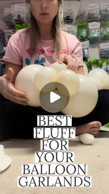 a girl holding balloons in her hands with the caption best glue for your balloon garlands