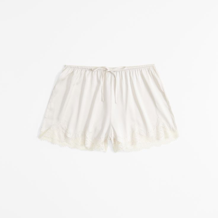 Indulge in the luxurious comfort of Abercrombie & Fitch's Lace and Satin Sleep Shorts, designed to enhance your nighttime routine. These elegant shorts combine the silky smoothness of satin with the delicate allure of lace, making them a must-have in your sleepwear collection.

- **Size**: Medium
- **Color**: Cream
- **Material**: Body - Polyester, Elastane; Lace Detail
- **Gender**: Female
- **Age Group**: Adult

Crafted with an elasticated drawstring waistband, these shorts offer a perfect fit Spring Loungewear Shorts With Lace Trim, Spring Lounge Shorts With Lace Trim, Cotton Lace Trim Shorts For Daywear, Cotton Shorts With Lace Trim For Daywear, Summer Lace Trim Loungewear Shorts, Lace Trim Shorts For Daywear, Summer Loungewear Shorts With Lace Trim, Cotton Pajama Shorts With Lace Trim For Spring, Relaxed Fit Lace Trim Sleepwear For Loungewear