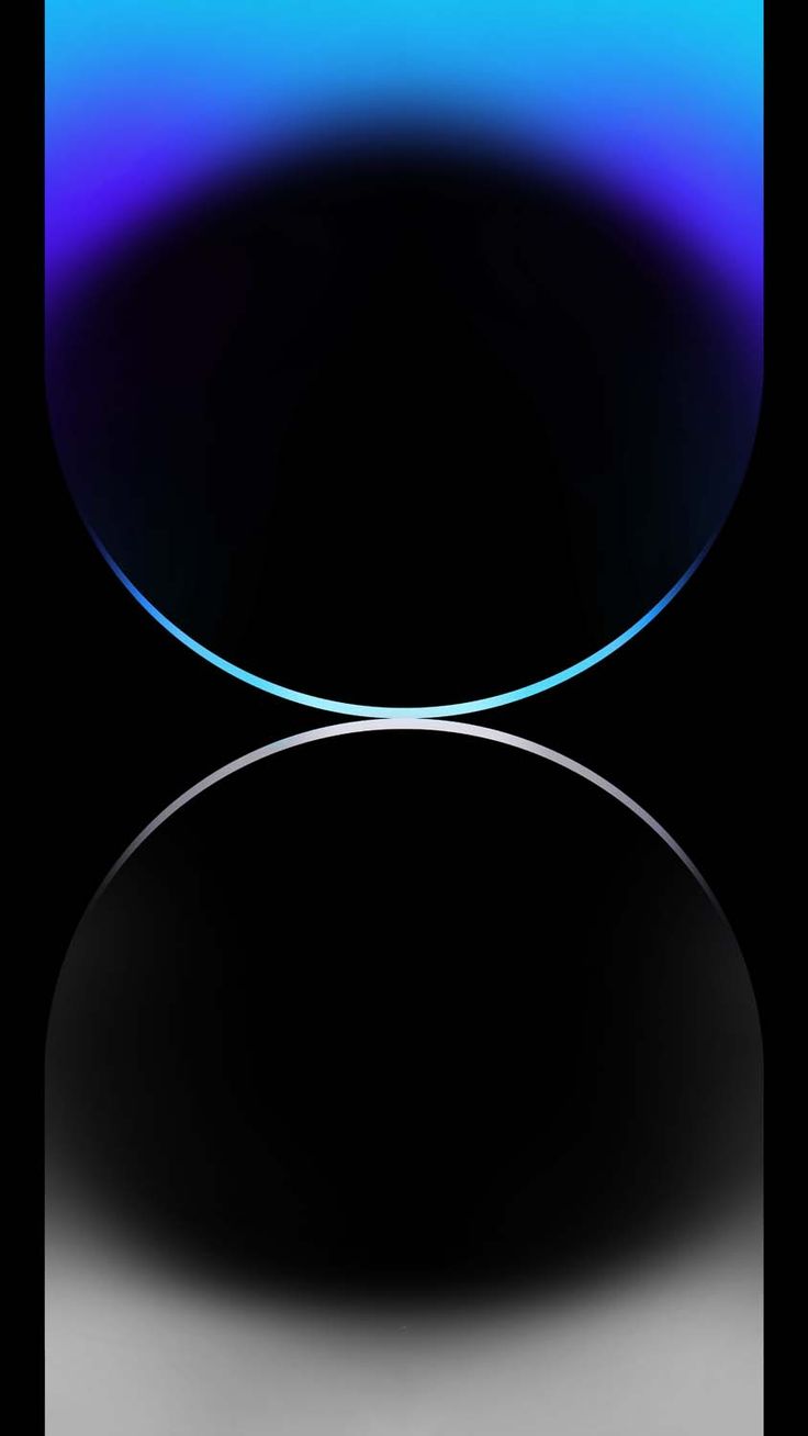 an apple logo on a black background with blue and purple lights in the center,