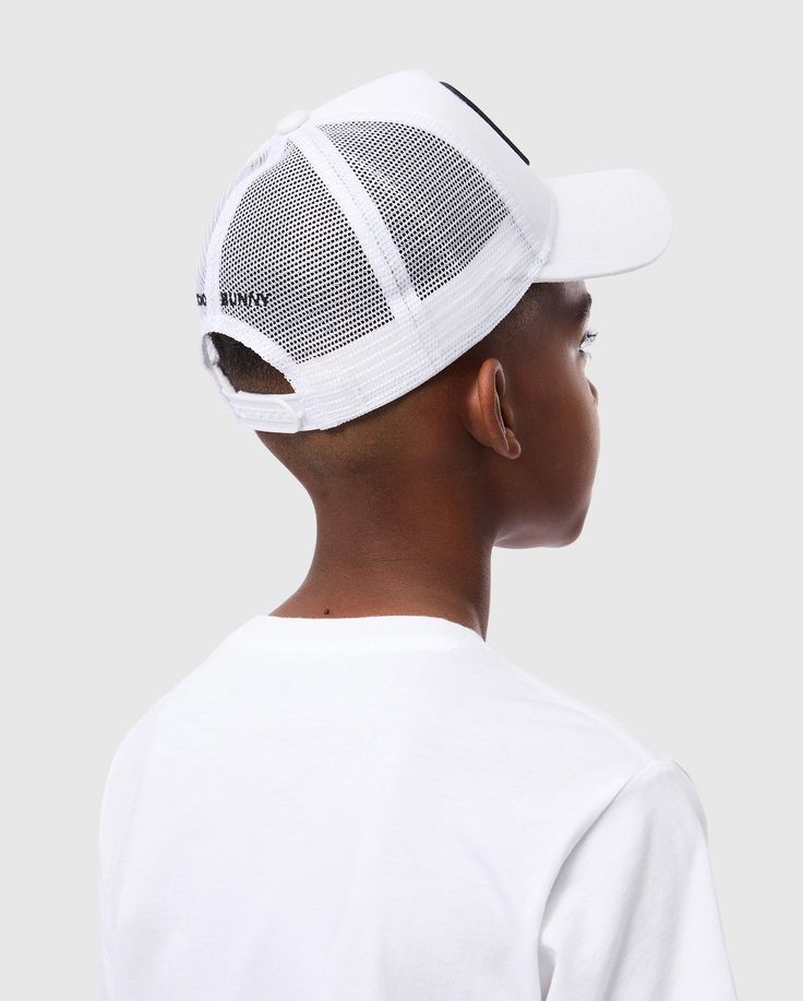 Featuring a paneled construction with breathable mesh paneling at the back, the kids' Bunny Patch trucker hat is accented with a Bunny logo patch across the front. Also available for MenWoven - 100% cottonMade in ChinaCapsSpice up your avatars' look with this bold style available on Roblox. Find us by searching for Psycho Bunny Official White Mesh Snapback Hat With Visor, White Trucker Hat With Mesh Back, Sporty White Mesh Snapback Hat, White Mesh Trucker Hat With Mesh Back, White Breathable Trucker Hat, White Trucker Hat With Mesh Back And Curved Bill, White Mesh Back Trucker Hat, White Mesh Trucker Hat With Curved Visor, Adjustable White Baseball Cap With Breathable Mesh