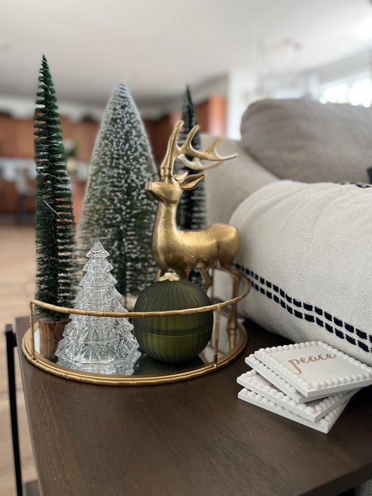 christmas decorations on a coffee table in a living room