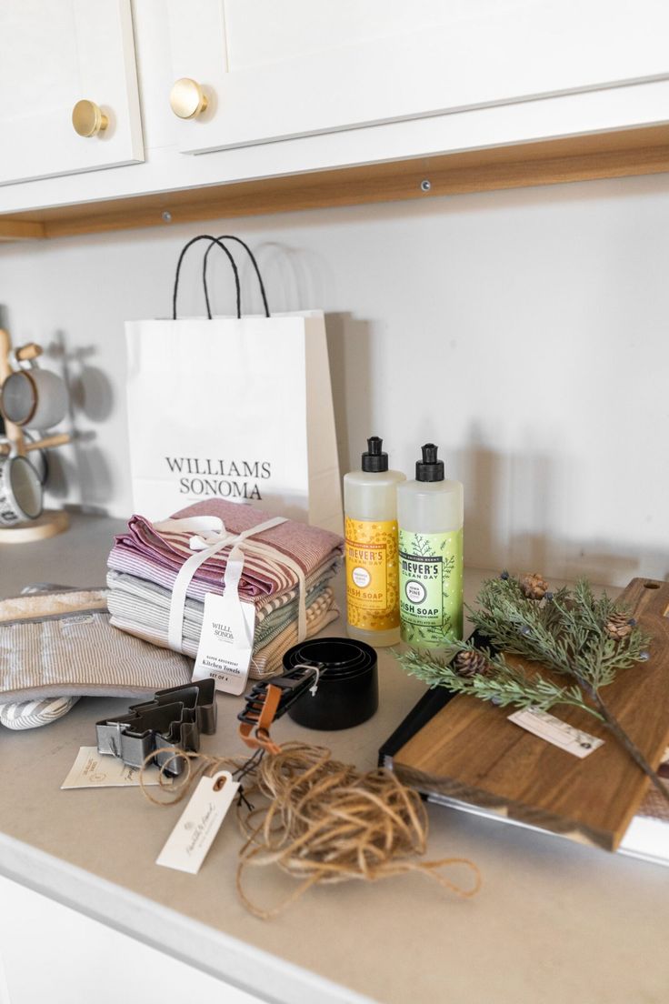 a counter top with various items on it and a paper bag next to the counter