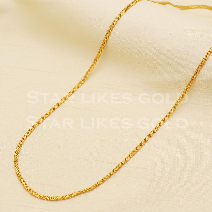 Adorn yourself with this elegant gold necklace, featuring a delicate chain and a stunning, handcrafted pendant. Its versatile design makes it a perfect accessory for both casual and formal looks, adding a subtle touch of glamour to your ensemble. yellow gold handmade chain jewelry from India. Brand- StarLikesGoldIndia Metal- yellow gold real gold. Metal purity- 18 Karat. Weight- 11.7 grams approx. Length - 21 inches approx Width-  2 millimeter, approx. Condition- excellent brand new Please feel Wedding Necklace With Delicate Chain In Link Shape, Wedding Necklace With Delicate Link Chain, Delicate Gold Snake Chain Necklace, Wedding Necklace With Delicate Chain And Link Shape, Elegant Gold Necklace With Delicate Chain, 14k Gold Wedding Chain Necklace, Gold Chain Necklace With Simple Design For Gift, Gold Minimalist Chain Necklace, Gold Chain Link Necklace For Wedding