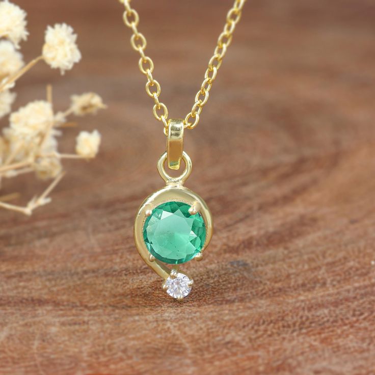 AAA Beryl Emerald pendant necklace for women, Gold chain necklace, Round cut Beryl Emerald pendant necklace, Minimalist pendant necklace.  **Next-Day Shipping with Valid Tracking Number** - D E T A I L S - * Gemstone - Beryl Emerald  * Stone Size - 6 MM Approx. * Stone Shape - Round * Color - Green  * Base Material - 925 Sterling Silver * Finish - 14K Gold Filled * Quality - AAA Grade Quality **Next-Day Shipping with Tracking Details** Shipping service - Free Worldwide Shipping - P A C K I N G - We are using bubble wrap on each product and then packing the product in a new carton for the highest protection. More Matching collections are available to purchase HERE: - https://www.etsy.com/shop/AreebaJewelry If you have any queries then just message us we are here for you. > ❥Thank you so muc Emerald Necklace Gold, Emerald Pendant Necklace, Emerald Necklace Pendant, Necklace Gold Chain, Minimalist Pendant, Emerald Pendant, Emerald Necklace, Necklace Minimalist, Emerald Stone