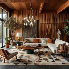 a living room filled with furniture and lots of windows