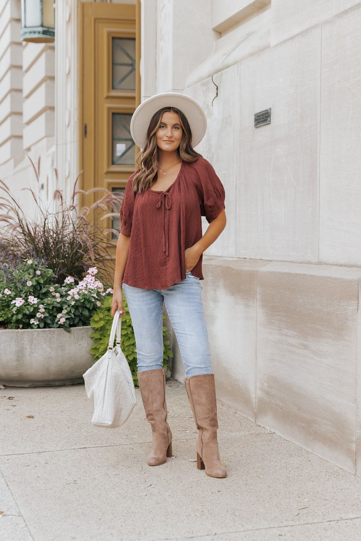 Perfect for any occasion, this top is sure to make a statement! Expertly designed for both style and comfort, our Wine Textured Half Sleeve Top is a must-have addition to any wardrobe. With half sleeves and a square neckline, this top offers a flattering silhouette. The adjustable self-tie detail at the neckline adds a touch of elegance, while the textured material made of 80% Rayon and 20% Nylon provides a soft and luxurious feel. Pair with jeans and knee high boots for a chic day to night look! Fall Peasant Top For Day Out With Relaxed Fit, Non-stretch Short Sleeve Blouse For Fall, Casual Fitted Blouse With Square Neck, Casual Fitted Square Neck Blouse, Casual Square Neck Fitted Blouse, Chic Relaxed Fit Peasant Top For Fall, Casual Square Neck Tops For Fall, Trendy Fall Puff Sleeve Top With Square Neck, Versatile Short Sleeve Blouse For Fall