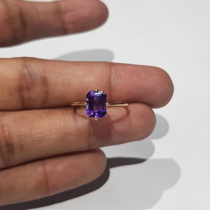 14k solid yellow gold natural emerald cut shaped amethyst gemstones ring. 1. The weight of the natural amethyst gemstone used in the ring =1.50 cts. 2. The weight of the 14k solid yellow gold used in the ring =1.170 grms. 3. The amethyst is the birthstone for the people born in the month of February. 4. The design of the ring is very nice and beautiful. 5. I have used all my skills and experience to manufacture this ring as beautiful as I can and I do hope that my work will be appreciated. Thank Purple Amethyst Ring With Prong Setting Rectangular, Yellow Gold Amethyst Ring With Emerald Cut, Emerald Cut Amethyst Ring In Yellow Gold, Emerald Cut Amethyst Ring For Formal Occasions, Rectangular Amethyst Ring For Anniversary, Yellow Gold Rectangular Amethyst Ring For Anniversary, Yellow Gold Amethyst Ring For Anniversary, Gold Amethyst Ring With Emerald Cut, Emerald Cut Amethyst Ring In Gold