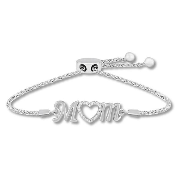 This lovely bolo bracelet for mom features a heart decorated with lab-created white sapphires for shimmer. Crafted of sterling silver, the bracelet has a wheat chain and sliding bolo clasp that allow it to adjust up to 9 inches in length. Adjustable Silver Jewelry Gift For Mom, Adjustable White Gold Bracelets For Mother's Day, Adjustable Jewelry For Mother's Day Anniversary, Adjustable Jewelry For Anniversary And Mother's Day, Adjustable White Gold Jewelry For Mother's Day, Cubic Zirconia Jewelry For Mom, Adjustable Diamond Jewelry For Valentine's Day, Valentine's Day Adjustable Diamond Jewelry, White Jewelry With Hallmark