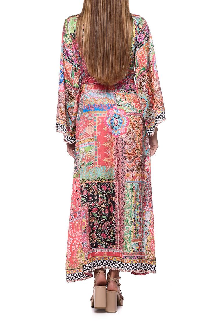 Go from beach to boardwalk in this sun-ready cover-up duster that's secured with a front tie and rendered in a bright print. Shawl collar Long sleeves Integrated waist tie
 100% polyester Hand wash, dry flat Imported Bohemian Multicolor Beach Cover-up Robe, Multicolor Long Robe For Beach Cover-up, Multicolor Long Robe For Beach, Spring V-neck Kaftan With Digital Print, Multicolor Summer Kimono For Beach Cover-up, Multicolor Bohemian Robe For Spring, Bohemian Multicolor Robe For Spring, Multicolor Bohemian Spring Robe, Multicolor Print Kimono For Spring Beach Cover-up