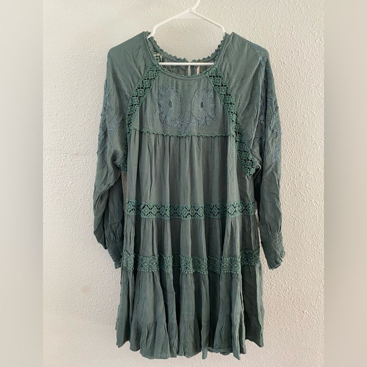 Brand New Never Worn Free People Dress. Lovely Weight And Cotton Lace Detail. Detachable Slip Snaps Into Dress At Shoulders. Green Lace Trim Dress For Fall, Green Flowy Dress With Lace Trim, Green Flowy Long Sleeve Boho Dress, Flowy Green Dress With Lace Trim, Casual Green Dress With Lace Trim, Green Lace Trim Dress For Brunch, Bohemian Green Mini Dress For Fall, Green Long Sleeve Boho Dress For Spring, Green Dress With Lace Trim For Day Out