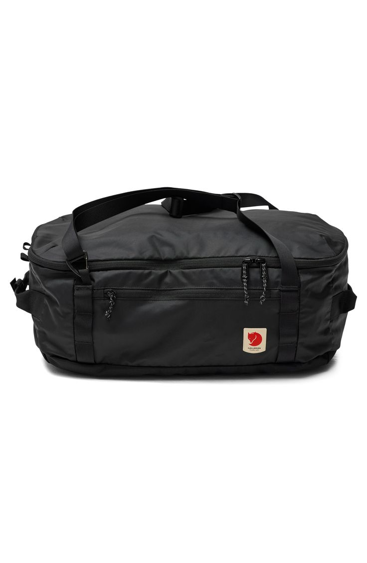 Whether you're heading out for a workout or the weekend, this duffle bag will have you covered with its water-resistant exterior and roomy interior. A multistrap design lends plenty of styling options so you can easily convert it to a backpack. Top zip-around closure Convertible carry straps; two side carry handles Exterior zip pocket Interior zip pocket 210-denier shell 100% recycled polyamide Imported Duffle Bag Aesthetic Men, Everyday Waterproof Functional Duffle Bag, Functional Black Waterproof Duffle Bag, Everyday Black Waterproof Duffle Bag, Sporty Black Weekender Bag For Outdoor Activities, Sporty Black Weekender Bag For Outdoor, Waterproof Black Gym Bag For Everyday Use, Everyday Waterproof Black Gym Bag, Everyday Black Waterproof Gym Bag