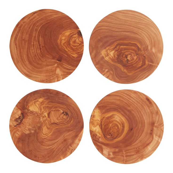 four wooden plates sitting on top of each other