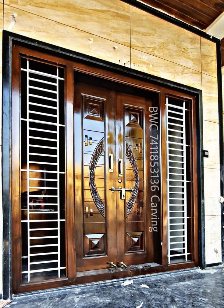 a wooden door with metal bars on it