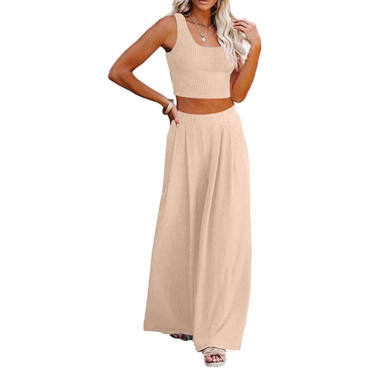 Elevate your fashion game with our Crop Top Long Sleeve Palazzo Pants Set. This stylish ensemble combines comfort and chic, making it a versatile addition to your wardrobe. Whether you're dressing up for a special occasion or looking for a stylish yet comfortable outfit for a casual day out, this set has you covered. The long sleeves provide added versatility, making it suitable for different seasons and settings. Specification: Unshrinkable, wrinkle-resistant fabric, always maintains its shape Wide Leg Non-stretch Pants, Non-stretch Two-piece Wide Leg Pants, Elegant Solid Color Sets For Day Out, Spring Two-piece Wide-leg Pants, Spring Solid Color Sets With Wide-leg Pants, Summer Loungewear Set With Ankle-length Pants, Summer Lounge Sets With Ankle-length Pants, Chic Summer Sets With Ankle-length Pants, Chic Wide-leg Pants Sets In Solid Color