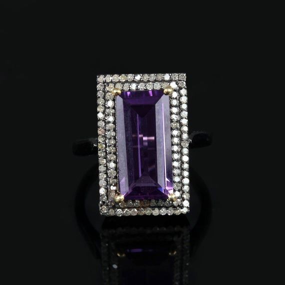 ⚫ This Ring Made With Amethyst & Diamonds in 925 Sterling Silver,⚫ Pave Diamond Gemstone Cocktail Ring 925 Sterling Silver Jewelry.⚫ Gemstone Ring, Diamond Jewelry, Everyday Jewelry⚫ Special customize for Mother's day, Anniversary, Birthday Gift, Valentine, Christmas. Item Details:Gross Weight:6.31 Grams925 Sterling Silver Weight:5.15 GramsDiamond Weight:0.91 CaratsAmethyst Weight:4.90 CaratsItem Size: 21x15 MMRing Size: US 7Item SKU: AROS-1392Gemstone color may vary due to natural and avail Luxury Purple Amethyst Ring, Rectangular Shape, Luxury Purple Amethyst Rectangular Ring, Luxury Purple Rectangular Amethyst Ring, Luxury Amethyst Ring With Halo Setting, Luxury Rectangular Amethyst Ring, Luxury Sterling Silver Diamond Ring With Gemstone Accents, Luxury Baguette Cut Gemstones For Gift, Luxury Rectangular Amethyst Jewelry, Luxury Amethyst Ring With Diamond Accents As Gift