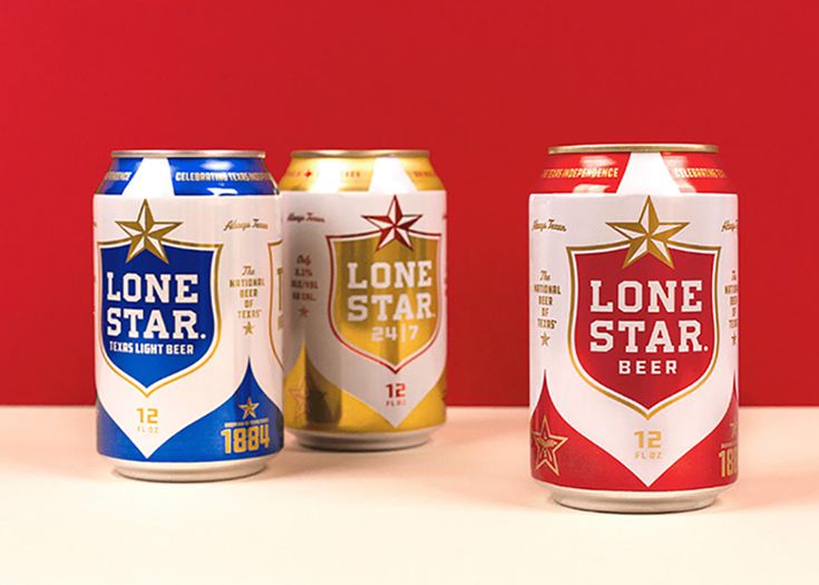 three cans of lone star beer on a table