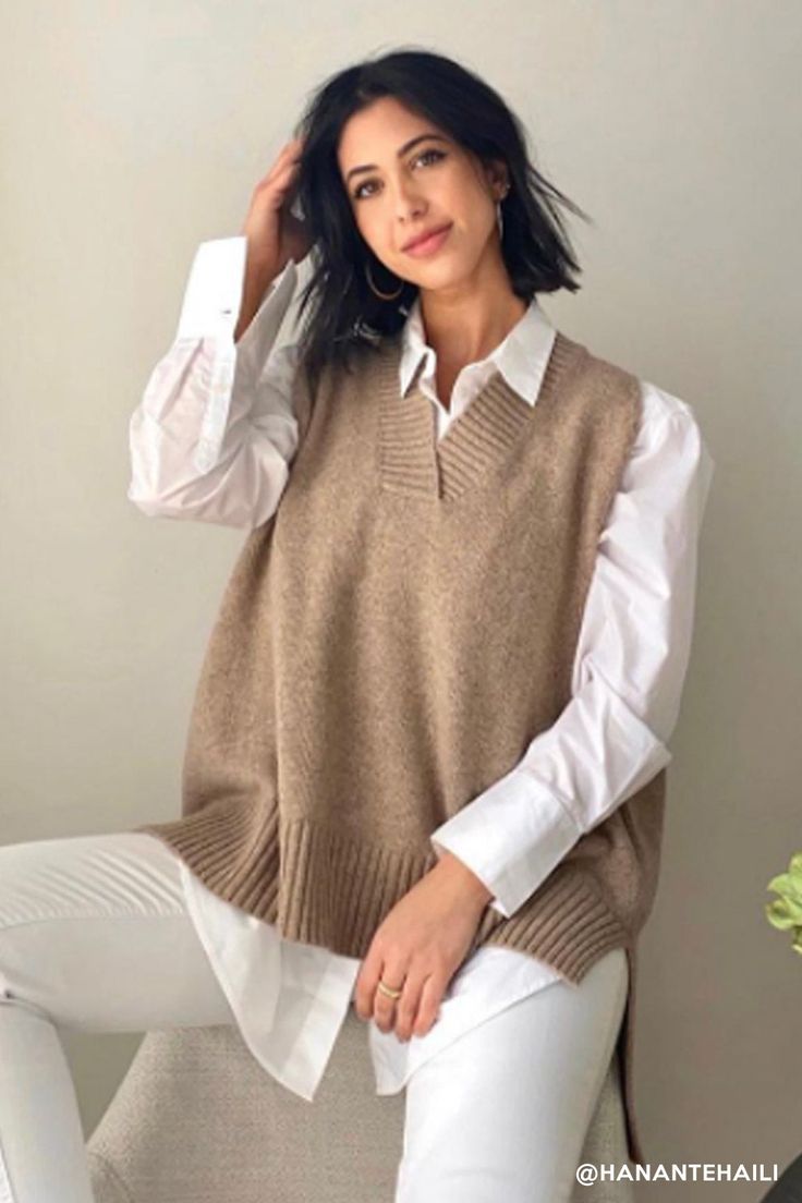 Lyla Oversized Knit Vest Enjoy newtro vibes! Featuring a super cozy wool blended knit material all over, a ribbed V-neck, an oversized fit, an asymmetric hem length silhouette, and pull on style * Product Specification Wool 55% Polyester 23% Nylon 22% * Flat Measurement: S/M: Shoulder: 32??(12.6in) / Bust: 65??(25.6in) / Length: 79??(31.1in) * Professional Clean OnlyModel's height is 5'7" (176cm) Bust 32in Waist 24in Hip 35in and wearing S/M Knit Sweater Vest For Fall, Fall Knit Sweater Vest, Cozy Textured Knit Sweater Vest For Fall, Chunky Knit Sweater Vest For Layering, Winter Chunky Knit Sweater Vest For Layering, Chunky Knit Sweater Vest For Winter, Fall Workwear Knitted Sweater Vest, Fall Sweater Vest For Layering, Cozy Cable Knit Sweater Vest For Fall