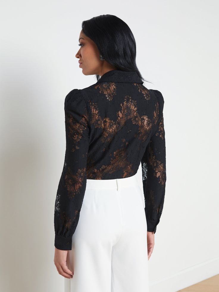 Our most feminine button-up blouse, now in chic black lace. Puff shoulders create gentle volume while a sharp collar adds definition. Pair with white denim for a romantic day-to-night look. | L'AGENCE Jenica Lace Blouse Top In Black Formal Lace Top With Lace Collar For Fall, Formal Fall Lace Top With Lace Collar, Formal Lace Collar Top For Fall, Chic Long Sleeve Lace Top For Formal Occasions, Chic Lace Top With Lace Cuffs, Chic Formal Long Sleeve Lace Top, Chic Lace Blouse With Lace Cuffs, Chic Blouse With Lace Cuffs For Work, Elegant Lace Top For Night Out In Fall