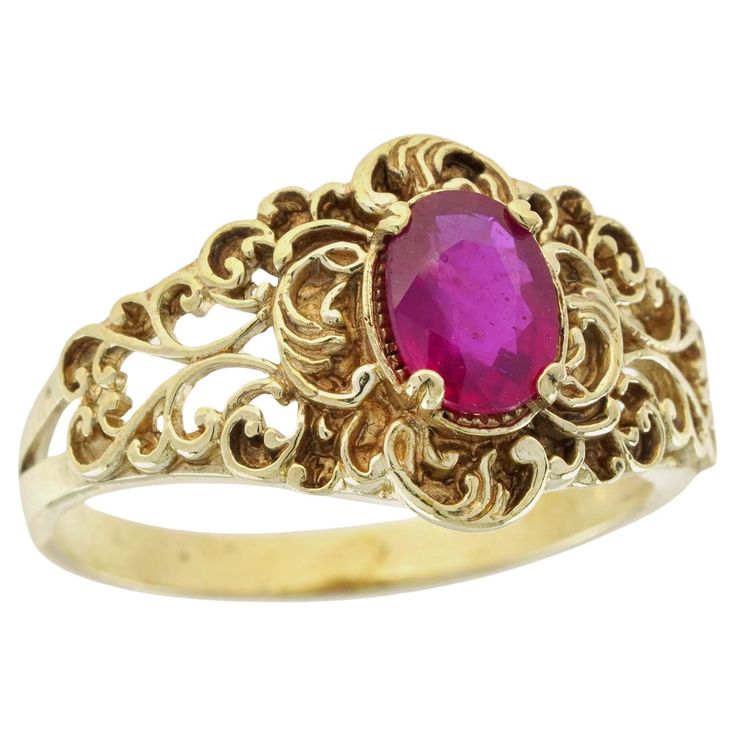 Add a delicate and unique aesthetic to your hand with this filigree ring by GEMMA FILIGREE. Our antique design gold filigree rings equate to delicacy and light openwork, while maintains strength for everyday wear for a lifetime. This striking filigree design ring with floral and leaf motif is a symbol of growth and femininity, encompassing a beautiful meaning for the wearer. CHARACTERISTICS Status: Made to order Origin: Thailand Metal: Solid 9K Yellow Gold Ring Size: US 4 - 8 Total Gemstones Weight: 1.00 carat (approx.) Total Gram Weight: 4.30 g. (approx.)*Pictures have been enlarged to show details* PRIMARY STONE(S) Stone: Natural Ruby Color: Red Shape: Oval Size: 7 x 5 mm. Number: 1 Weight: 1.00 Carat (approx.) An attractive ring box is included. We dispatch all items via a secure and tr Filigree Rings, Filigree Ring Gold, Beautiful Meaning, Ruby Color, Floral Filigree, Leaf Motif, Filigree Design, Gold Filigree, Antique Design