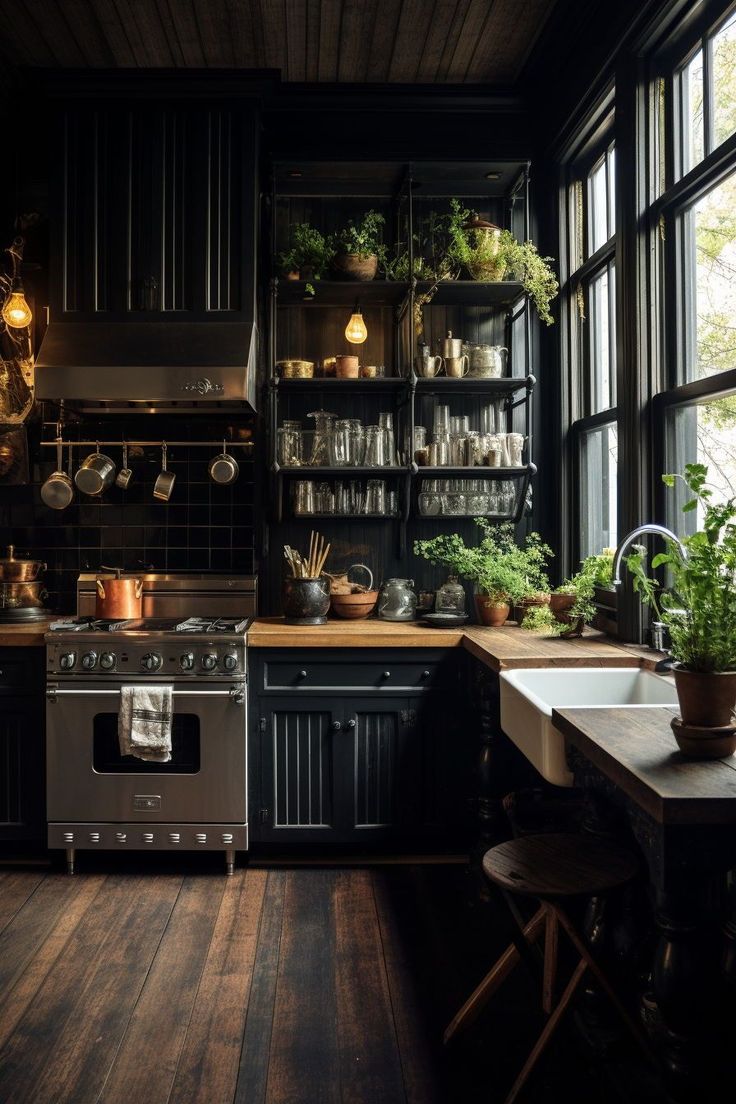 a kitchen filled with lots of pots and pans next to a stove top oven