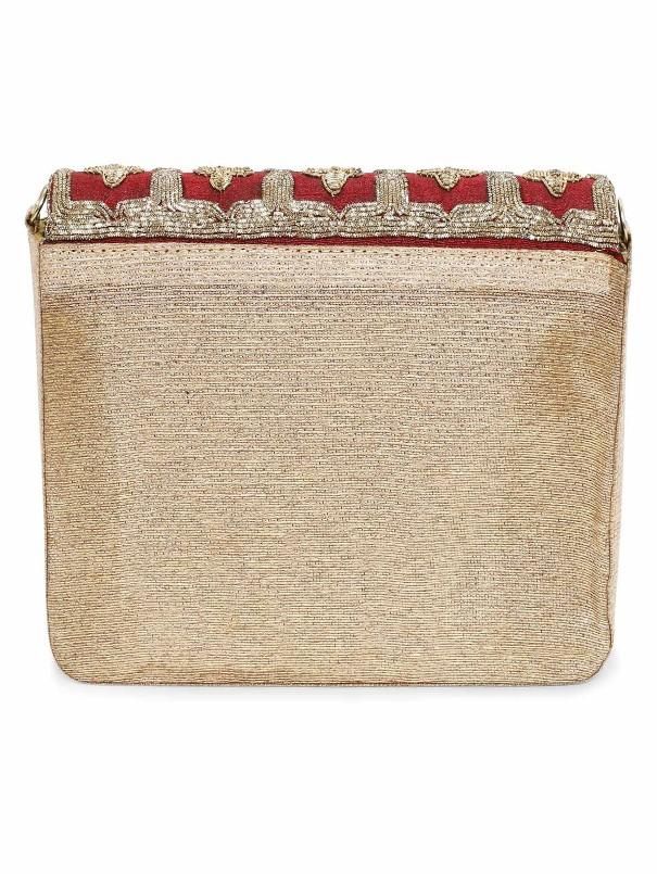 A maroon clutch forms an important accessory in the trousseau collection of a bride-to-be. Buy it now. Composition: Raw Silk Size: 6.5" x 5.5" x 2" Unique Work: Hand-embroidered Ready to Ship within 10-15 days Maroon Clutch, Add Sleeves, Indian Wedding Wear, Gold Clutch, Royal Red, Shoe Size Chart, Wedding Wear, Raw Silk, Red And Gold