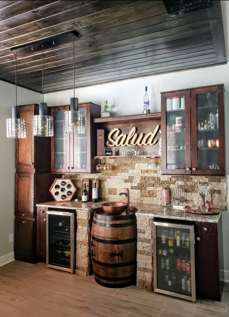 a wine barrel in the middle of a kitchen