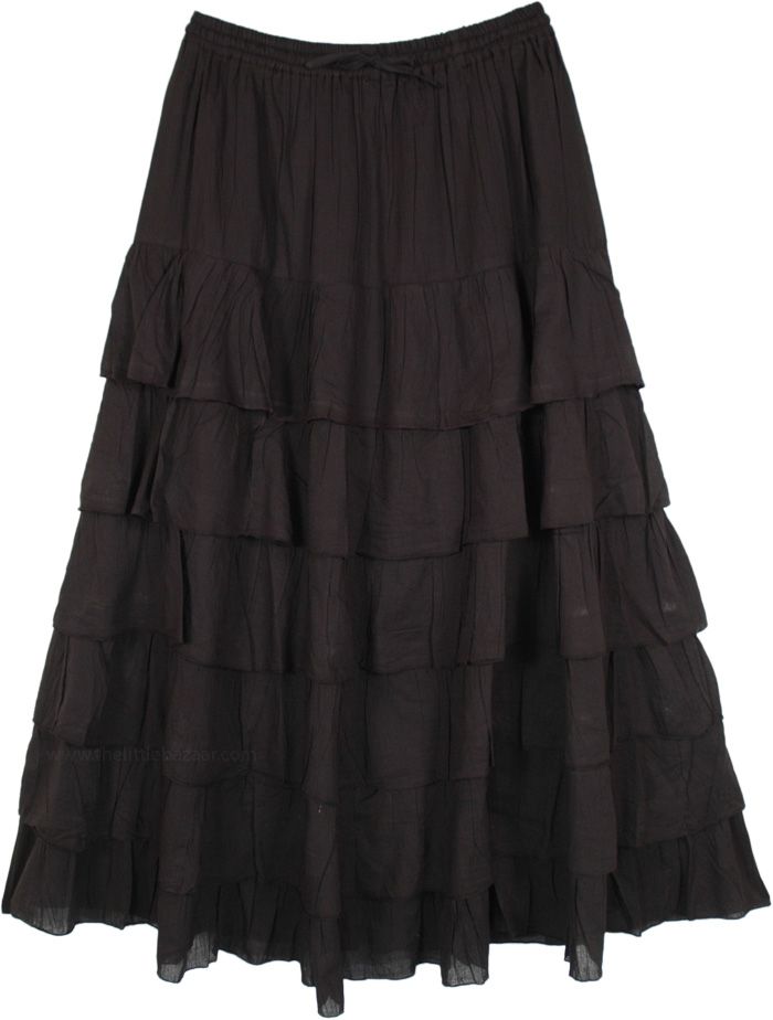 A black cotton maxi skirt with a difference - the flouncy ruffles makes for a bold addition to your bohemian wardrobe.  The skirt has an elastic waist with a drawstring for sizing flexibility. #tlb #Crinkle #TieredSkirt #MaxiSkirt #FairycoreSkirt #TieredSkirt #PixieSkirt Black Tiered Gathered Skirt, Flowy Black Bohemian Maxi Skirt, Black Bohemian Skirt With Ruffles, Bohemian Black Flowy Maxi Skirt, Bohemian Black Maxi Skirt, Spring Black Maxi Skirt With Ruffle Hem, Black Flowy Tiered Skirt, Black Tiered Ruffled Maxi Skirt, Casual Black Tiered Maxi Skirt