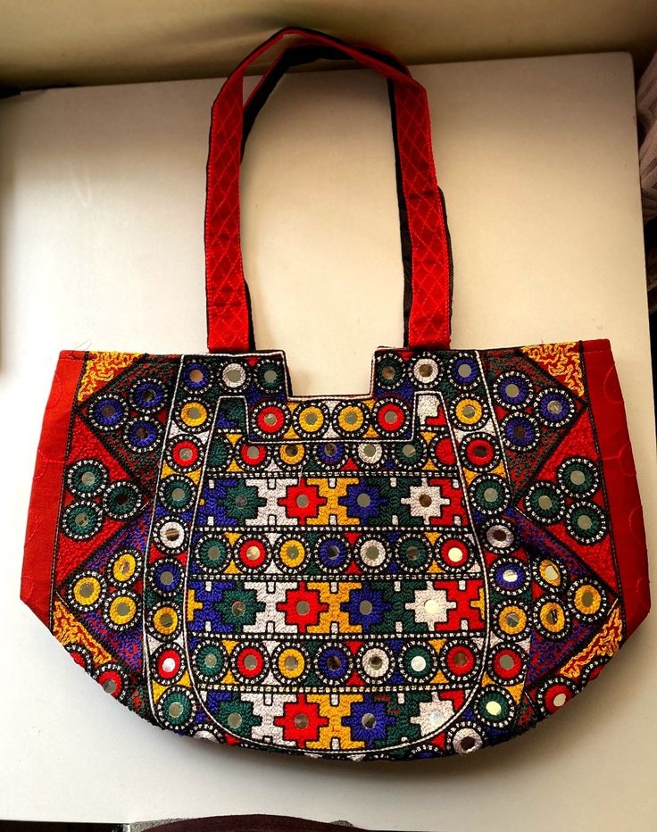 Sindhi cultural handicraft, ladies bag, light in weight and easy to carry.. Traditional Handheld Bag For Daily Use, Rectangular Hobo Bag For Everyday Use And Festivals, Handmade Multicolor Festival Bags, Handmade Multicolor Bags For Festivals, Traditional Handheld Bag For Everyday Use, Multicolor Handmade Bags For Festivals, Handheld Multicolor Bags With Handwork, Multicolor Rectangular Potli Bag For Daily Use, Handmade Rectangular Shoulder Bag For Festivals