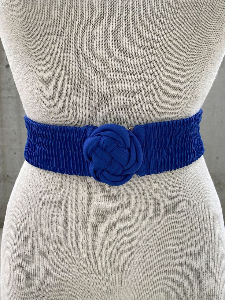 Vintage electric blue fabric elastic belt, fabric rose buckle, knot waist stretchy belt, maximalist blue belt, boho hippie accessories This vintage electric blue fabric elastic belt is a must-have accessory for any fashion-forward maximalist looking to add a touch of boho hippie charm to their wardrobe. The stretchy design is made of fabric, making it both comfortable and durable, while the vibrant electric blue color is sure to make a statement. Featuring a unique fabric rose buckle, this belt adds a touch of whimsy and elegance to any outfit. The knot waist design adds a touch of texture and visual interest, making it a versatile accessory that can be dressed up or down. Whether you're looking to complete your boho hippie look or simply want to add a pop of color to your everyday wardrob Belt Collection, Hippie Accessories, Vintage Tie Dye, Purple Belt, Fabric Rose, Tie Dye Fabric, Dye Fabric, Hippie Look, Blue Belt