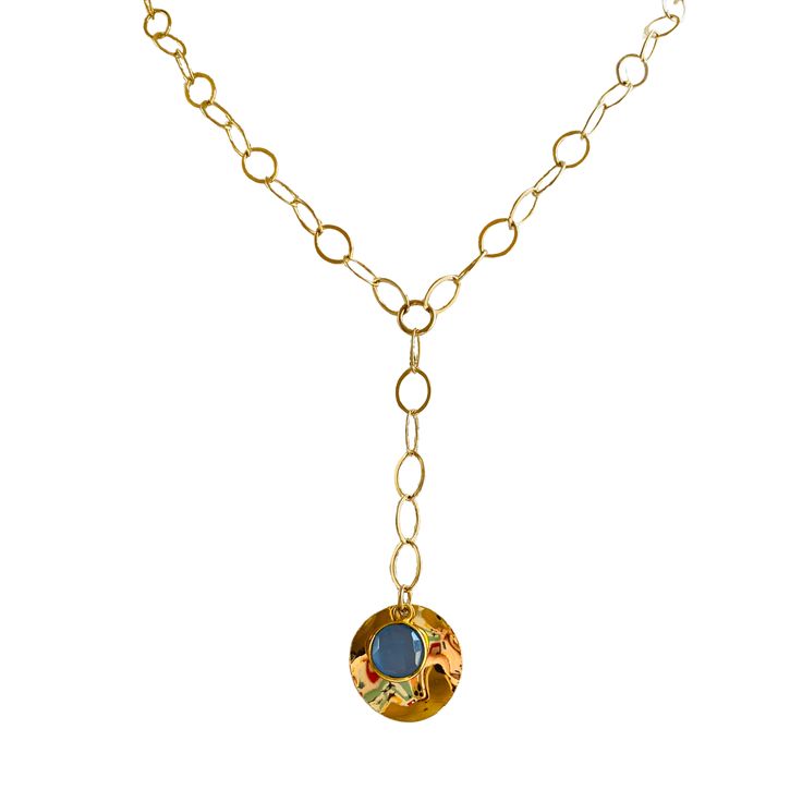 This stunning necklace showcases the captivating beauty of a blue sodalite gemstone layered over a gold circular pendant, elegantly dangling from a 2-inch lariat chain. The combination of the rich blue sodalite and the lustrous gold creates a striking contrast, resulting in a unique and eye-catching design. The blue sodalite gemstone is known for its deep and intense blue color, reminiscent of the serene ocean or the vast night sky. Its natural patterns and variations make each stone truly one-o Blue Lariat Jewelry With Adjustable Chain, Blue Gemstone Lariat Necklace, Blue Lariat Necklace With Adjustable Chain, Blue Long Lariat Necklace With Adjustable Chain, Blue Gold-plated Chain Necklace With Adjustable Chain, Elegant Blue Necklace With Coin Pendant, Blue Adjustable Gold-plated Chain Necklace, Blue Adjustable Gold Plated Chain Necklace, Gold Gemstone Lariat Necklace With Long Drop