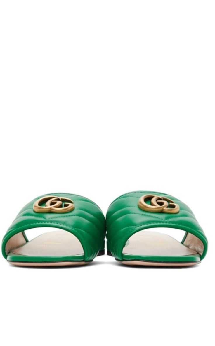 Green/gold-tone leather Double G leather sandals from GUCCI Signature Double G logoGold-tone hardwareChevron quiltingOpen toeSlip-on styleComposition: Calf Leather 100%Lining: Calf Leather 100%Sole: Calf Leather 100%Made in Italy Gucci Luxury Sandals With Gold-tone Hardware, Luxury Green Sandals With Padded Heel, Gucci Leather Sandals With Gold-tone Hardware, Luxury Gold-tone Hardware Sandals For Spring, Luxury Slides With Padded Heel, Luxury Slide Mules, Luxury Green Leather Sandals, Luxury Spring Slide Mules, Luxury Slide Mules For Spring